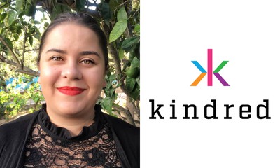 Maris Catania, Head of Responsible Gambling and Research at Kindred Group, is seen on the left: a pretty woman with dark brown hair pulled back, bright red lipstick, & a black lace top, smiling in front of green foliage. on the right is the Kindred logo