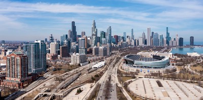 Aerial view of downtown Chicago. Soldier Field is seen on the right. Midweek MLS Battle: Chicago Fire vs. Inter Miami Betting Picks