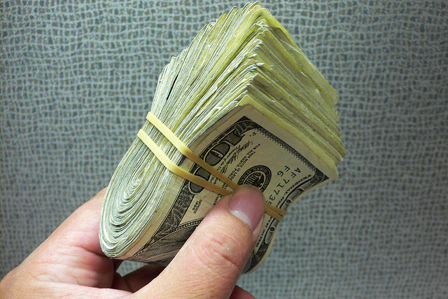 100-bill-roll.jpg