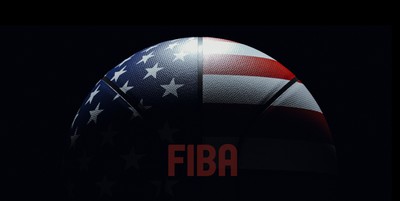 Brightly lit isolated basketball over black background colored like united states flag symbolizing Team USA competing in the FIBA basketball world cup competition