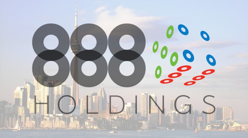 the logo for 888 Holdings Plc is seen as a transparent overlay on top of an image of the Toronto skyline. 888 has recently announced that they have secured a gaming license for Ontario and play to launch its online poker product in the provinc on April 4.