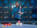 Andjelko Andrejevic hoists the World Poker Tour Cup in Amsterdam
