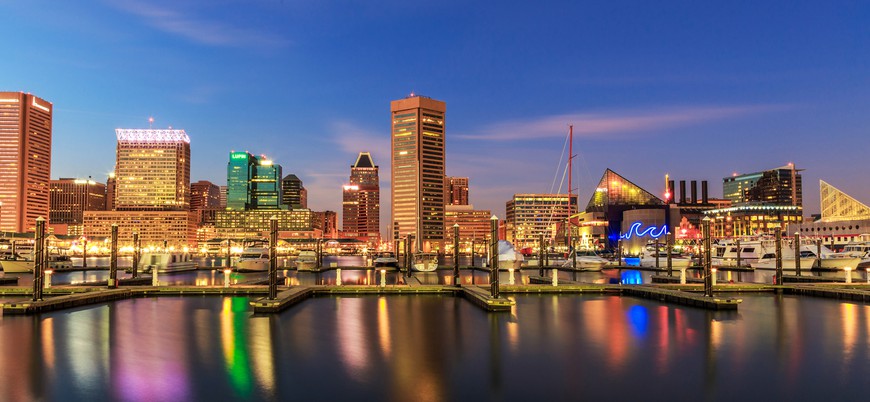 Inner Harbor in Baltimore, MD at night. Maryland Report Hints at Plans for Online Poker, Joining MSIGA
