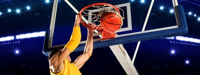 basketball player dunking the ball. Basketball Betting: The Ultimate Guide