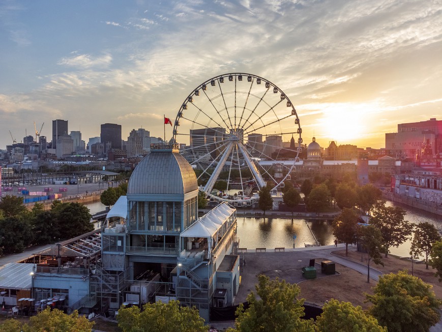 La Grande roue de Montreal Ferris wheel and downtown skyline in summer dusk. Québec, Canada. Could Québec Be Next Canadian Province With Online Poker?