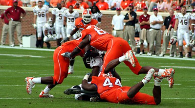The Clemson Tigers college football team in action. NCAAF ACC 2023: Betting Favorites and Expert Picks