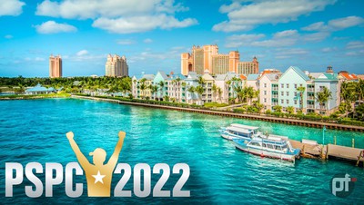 Nassau, the bahamas is seen from overhead. A lush tropical island paradise with beautiful turquoise water. Colorful houses and hotels line the shore, surrounded by palm trees. a boat is in the water. the logo for PokerStars PSPC 2022 is in the bottom left