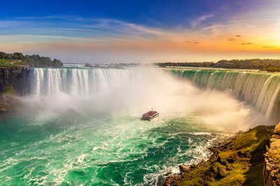 Canadian side view of Niagara Falls, Horseshoe Falls and boat tour at sunset in Niagara Falls, Ontario, Canada. PokerStars Reclaims Top Spot in Ontario Online Poker
