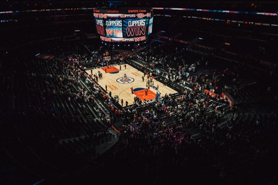 a crowded arena watches a LA Clippers basktball game at the Crypto.com Arena. 2023-24 NBA Western Conference: Predictions & Betting Odds