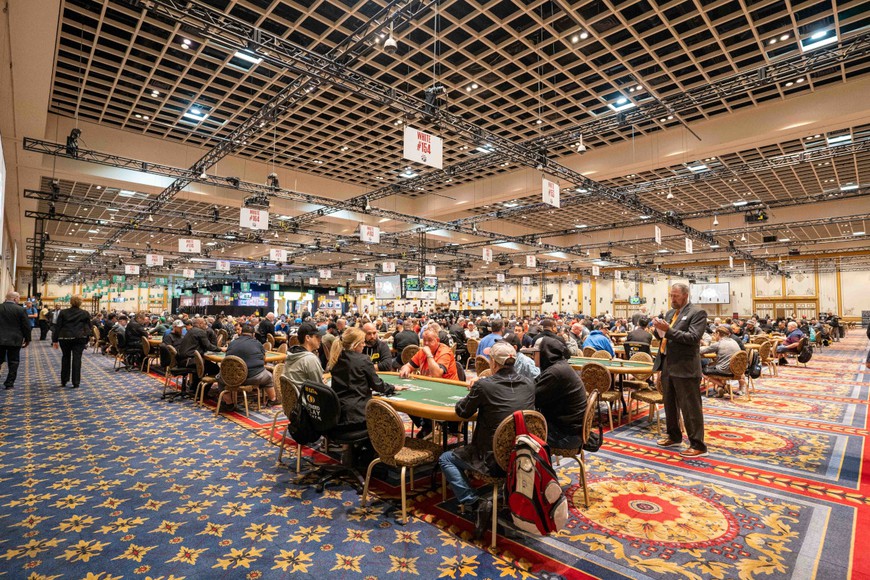 a large room full of poker tables surrounded by players at the 2023 WSOP in Las Vegas. WSOP 2023: Record-Breaking Attendance Surpasses 2022 Edition by 10%